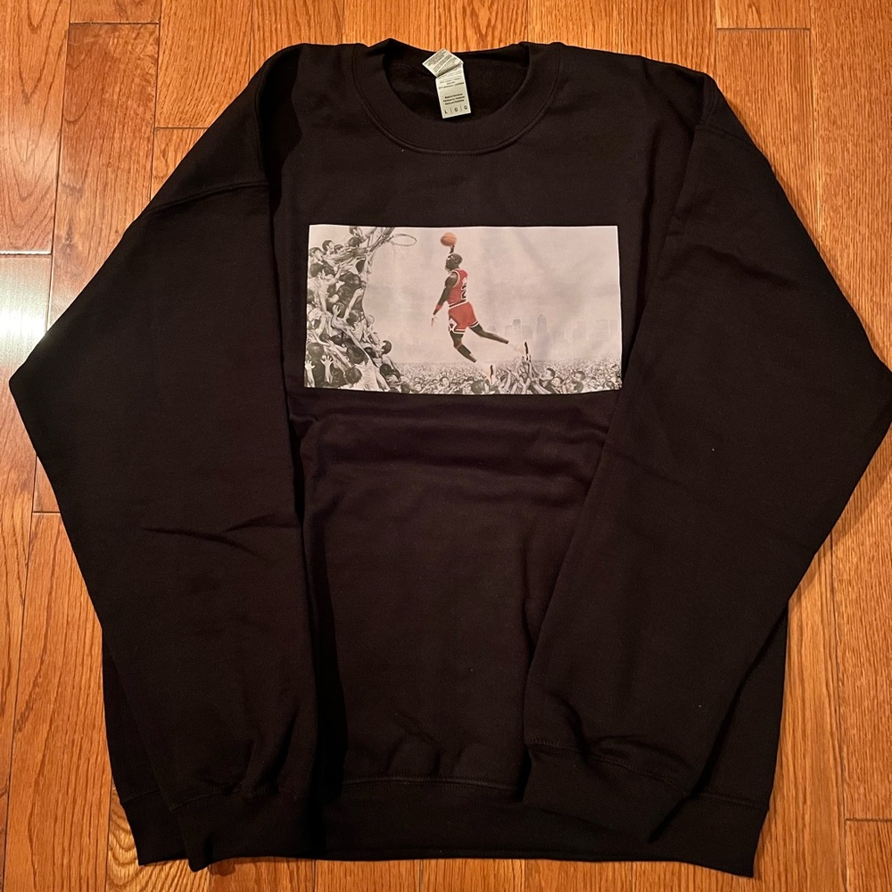 Jordan sweater.  Large.  Black.. New never worn